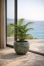 Pot Fabien Mystic Green – Cache-pot rond en métal vert fait main mat texturé Ø57xH54